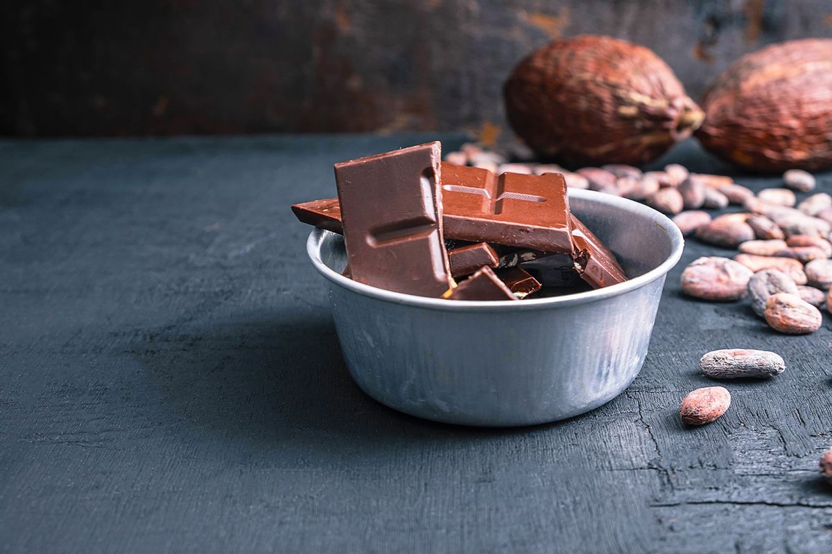 Dark chocolate pieces and cocoa beans (Getty Images/Caterina Oltean/500px)