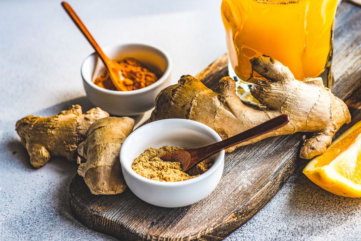 Fresh turmeric, ginger and orange drink (Getty Images/annabogush)