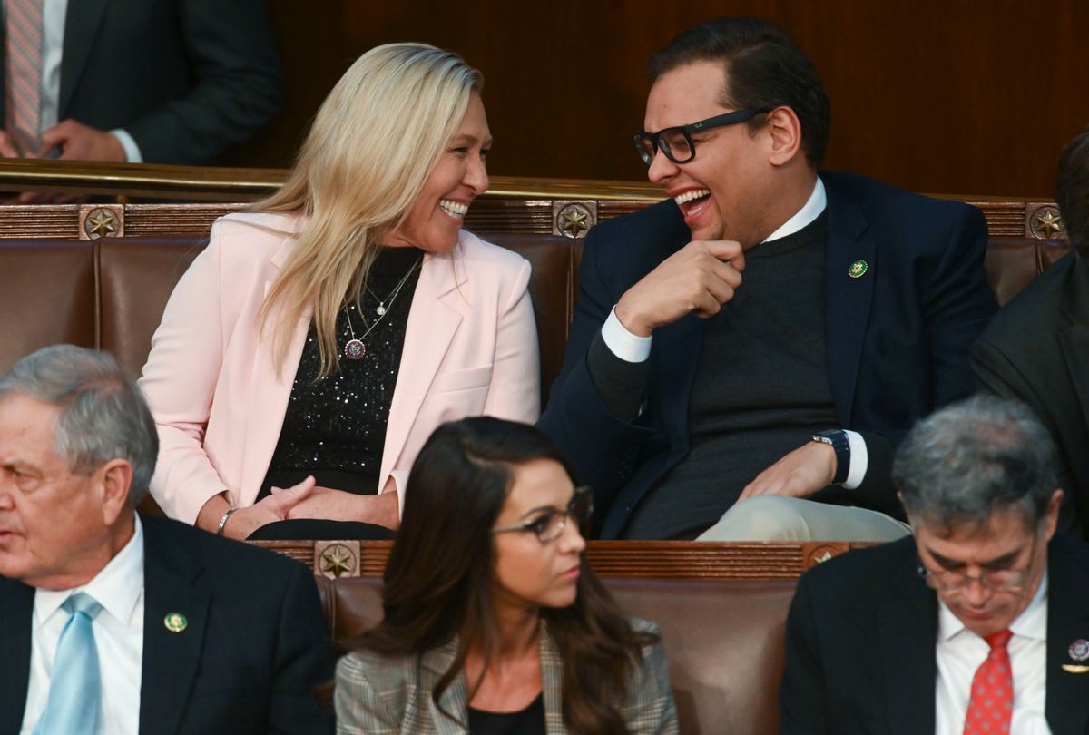 Rep. Marjorie Taylor Greene (R-Ga.) laughs with Rep. George Santos (R-N.Y.) as voting for speaker continues for a third day during a meeting of the 118th Congress, Thursday, January 5, 2023, at the U.S. Capitol in Washington DC. (Matt McClain/The Washington Post via Getty Images)