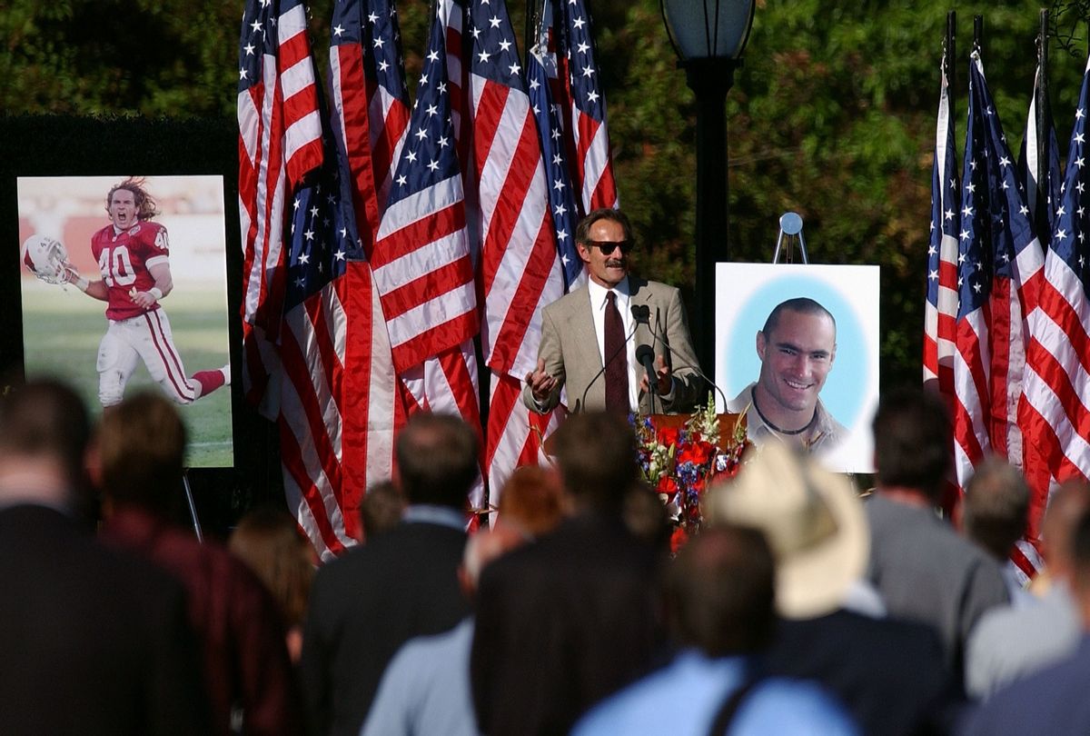 Pat Tillman Sr. speaks at a memorial service for his son Cpl. Pat Tillman, who was killed in action in Afghanistan April 22, 2004, at the San Jose Municipal Rose Garden May 3, 2004 in San Jose, California. Tillman turned down a lucrative NFL contract to serve with as a US Army Ranger. (David Paul Morris/Getty Images)
