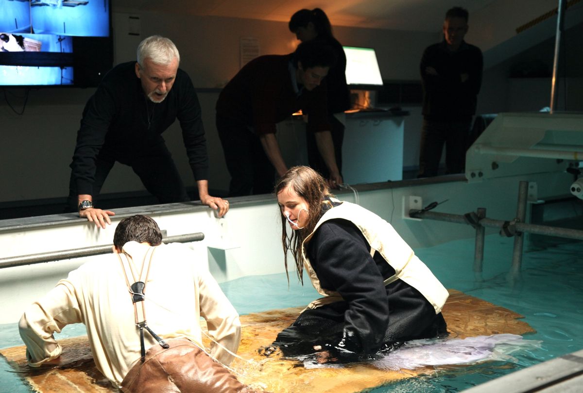 James Cameron checks in on Josh Bird and Kristine Zipfel, who are exposed to firgitd waters to test the impacts of hypothermia in "Titanic 25 Years Later" (National Geographic/Spencer Stoner)