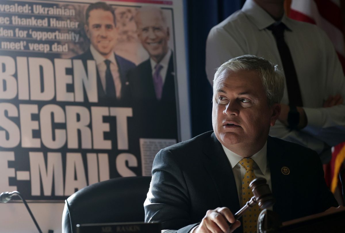 With a poster of a New York Post front page story about Hunter Biden’s emails on display, Chairman Rep. James Comer (R-KY) announces a recess because of a power outage during a hearing before the House Oversight and Accountability Committee. (Alex Wong/Getty Images)