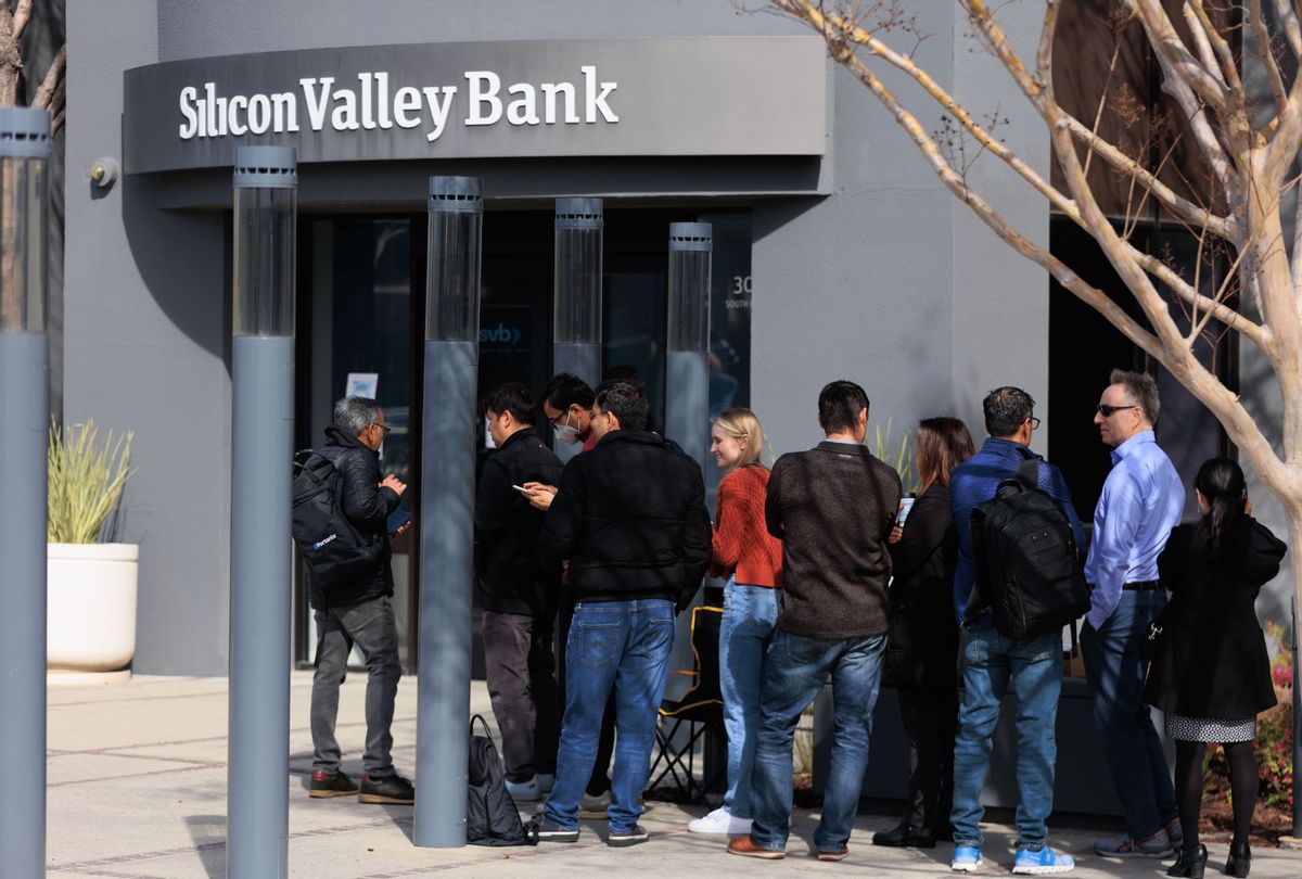 People wait outside the Silicon Valley Bank headquarters in Santa Clara, CA, to withdraw funds after the federal government intervened upon the bank's collapse, on March 13, 2023.  (Nikolas Liepins/Anadolu Agency via Getty Images)