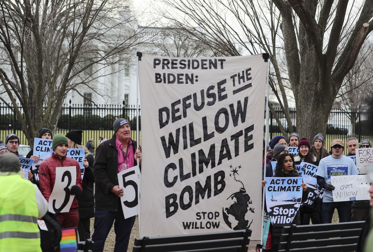 Climate activists gather to protest demanding President Biden stop the Willow Project by unfurling a banner on Lafayette Square in front of the White House on January 10, 2023 in Washington D.C. (Celal Gunes/Anadolu Agency via Getty Images)