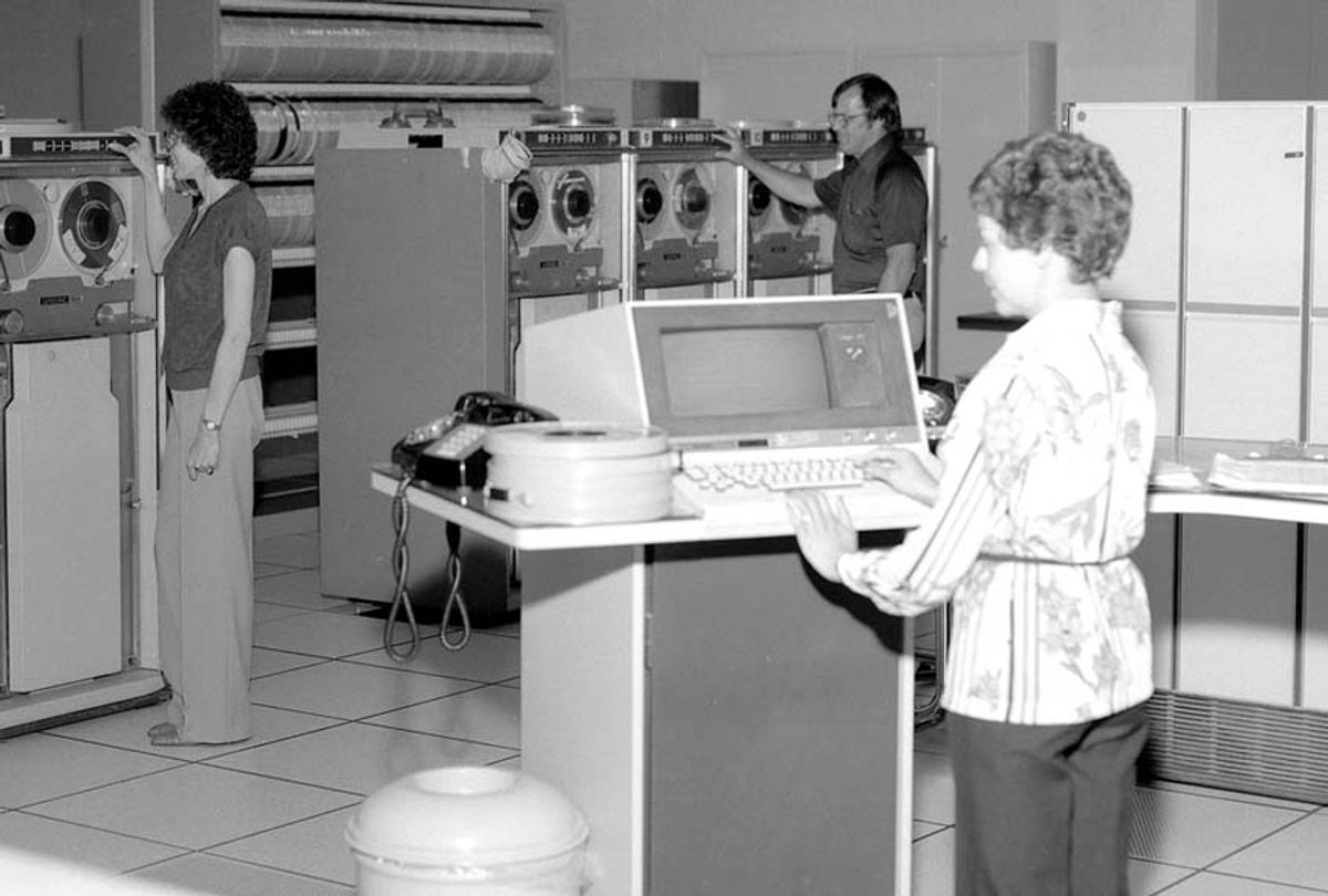 Computer room and workers ca. 1980.  (HUM Images/Universal Images Group via Getty Images)