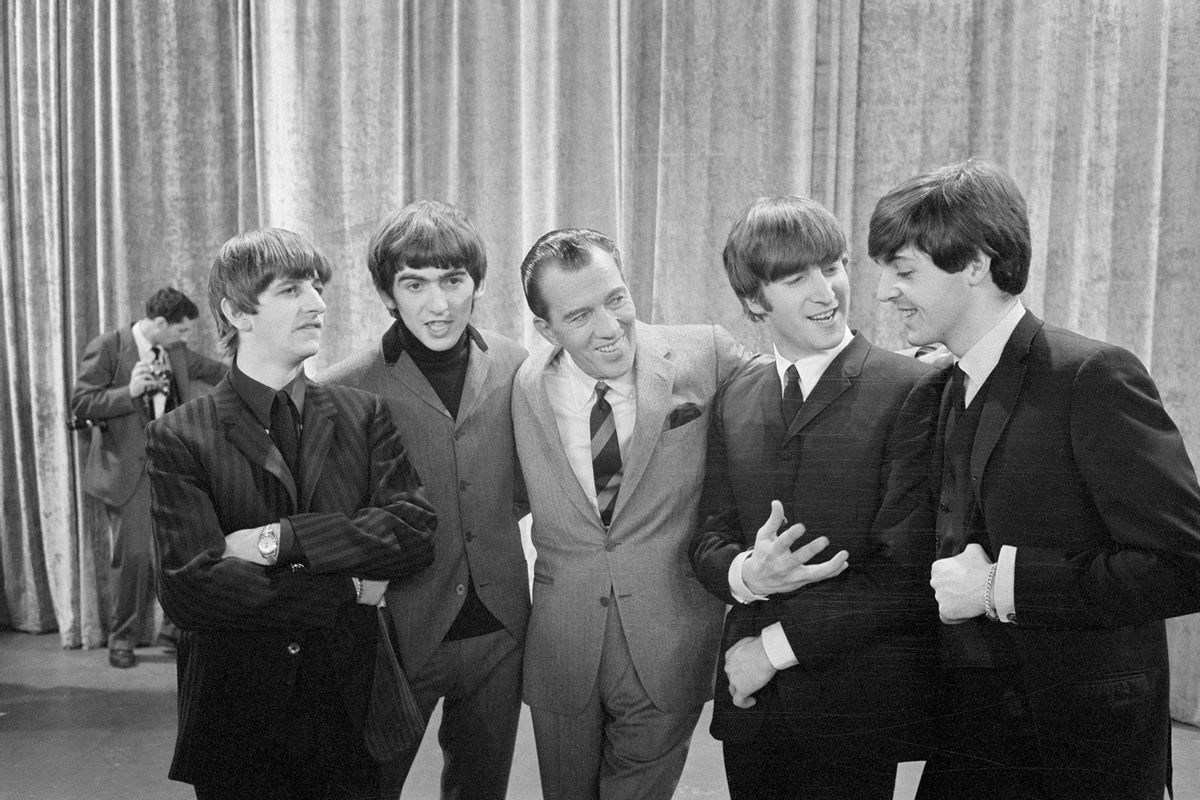 Television host Ed Sullivan stands with English rock 'n' roll sensations the Beatles in between rehearsals at CBS television studios in Manhattan. (Getty Images/Bettmann)