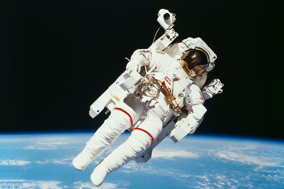 American astronaut Bruce McCandless II photographed from the Space Shuttle Challenger during the first untethered EVA, made possible by his nitrogen jet propelled backpack (Manned Manuevering Unit or MMU), 7th February 1984. (NASA/Space Frontiers/Getty Images)