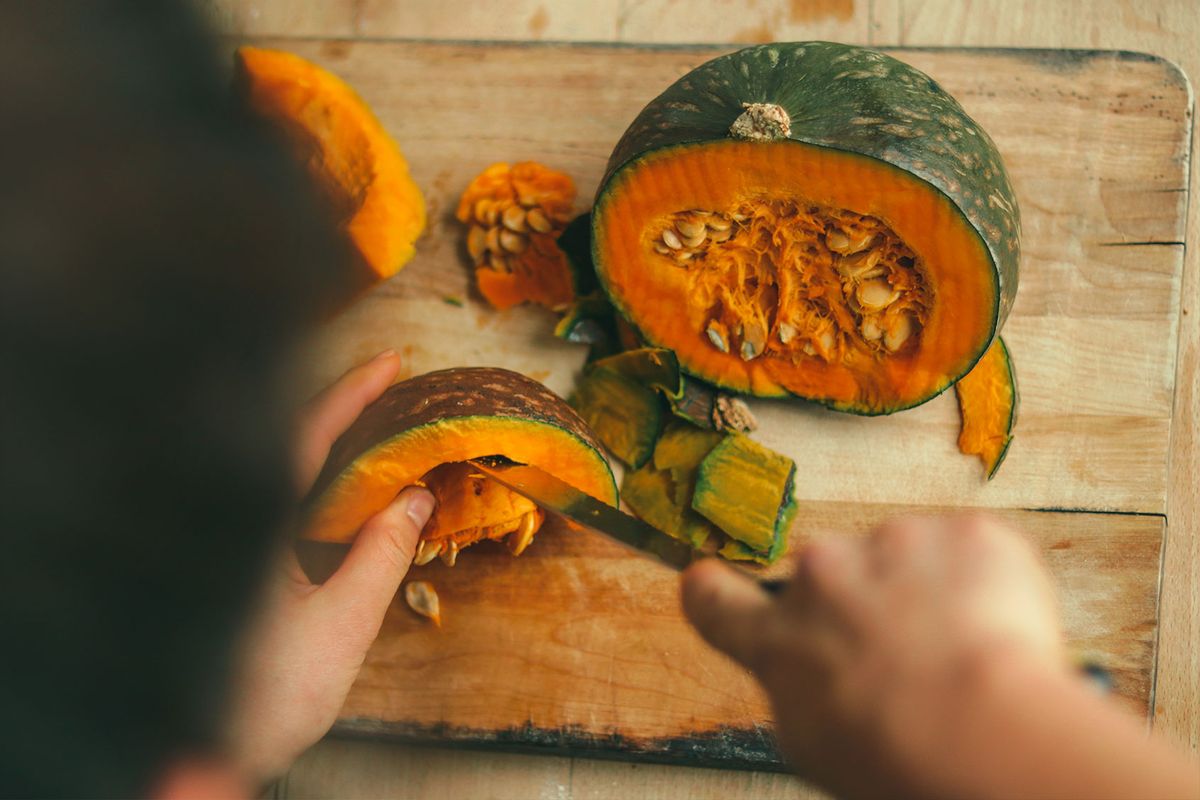 Cutting up a Kabocha (Getty Images/Kristina Vianello)