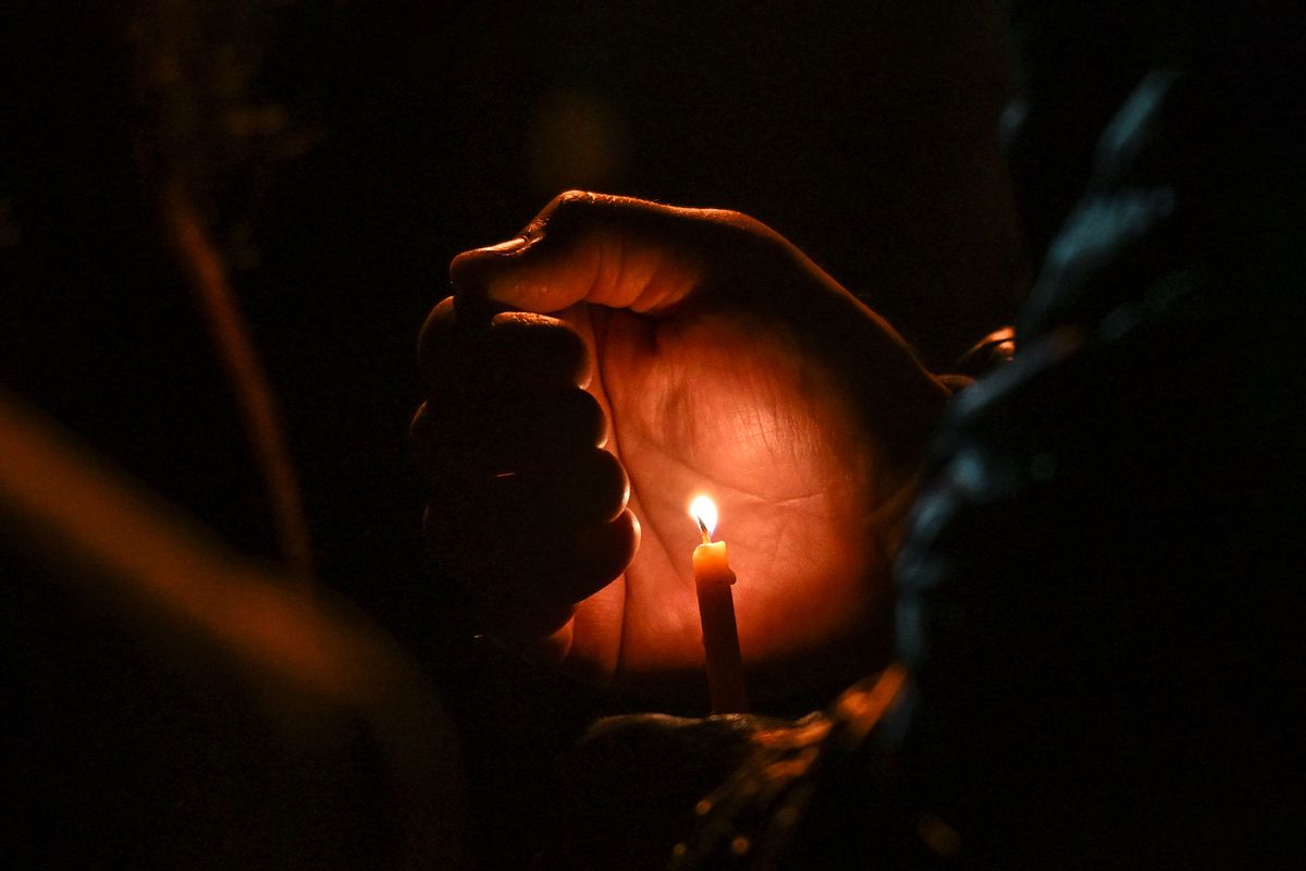 Members of the Jewish diaspora of Edmonton gather during a candlelight vigil and community-wide Havdalah ceremony to mark the one-week anniversary of the Hamas terror attack in Israel, on October 9, 2023, in Westridge Field, Edmonton, Alberta, Canada. (Artur Widak/NurPhoto via Getty Images)