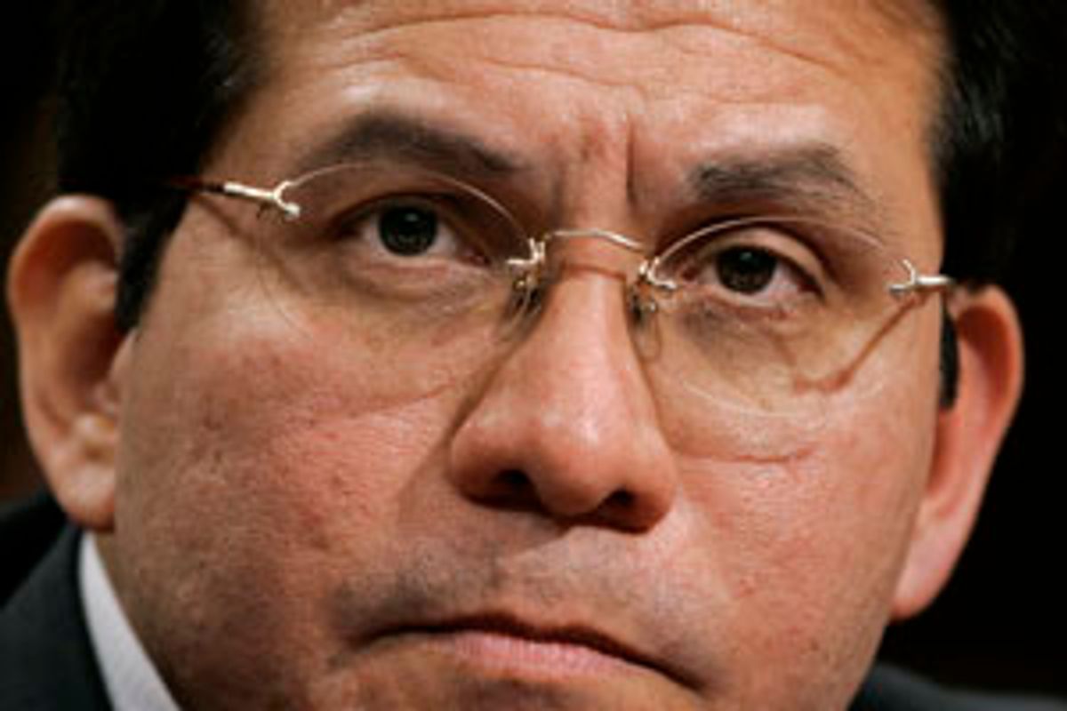 Attorney General Alberto Gonzales takes questions by the Senate Judiciary Committee on whether President Bush, and others in the executive branch, acted illegally in permitting domestic surveillance by the National Security Agency, on Capitol Hill in Washington, Monday, Feb. 6, 2006. He insisted that President Bush is fully empowered to eavesdrop on Americans without warrants as part of the war on terror and he cautioned Congress not to end or tinker with the program.  (AP Photo/J. Scott Applewhite) (J. Scott Applewhite)