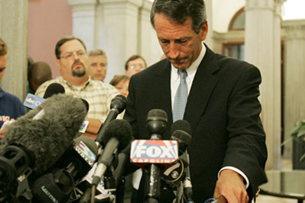 South Carolina Gov. Mark Sanford pauses to look at his notes as he admits to having an affair during a news conference Wednesday, June 24, 2009, and that was the reason why he was in Argentina.  He also announce that he is resigning as chairman of the Republican Governors Association.    