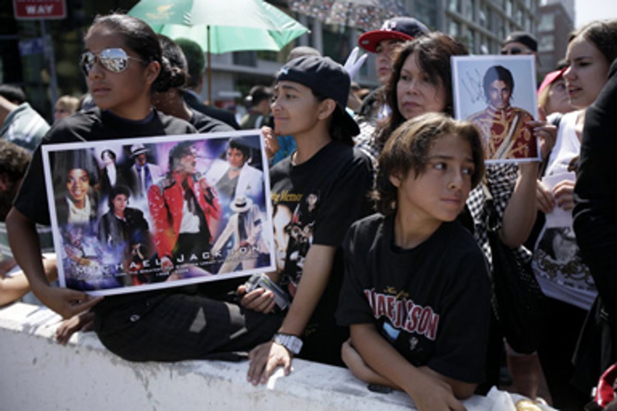 Fans outside a memorial service for Michael Jackson Tuesday, July 7, 2009, in Los Angeles