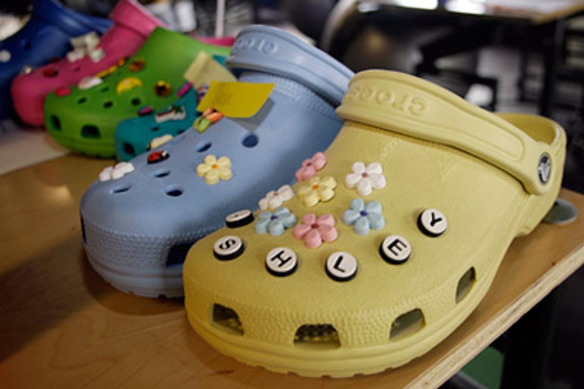 In this Oct. 3, 2006 file photo, Crocs shoes are seen in Boulder, Colo.  In a report released on Wednesday, March 18, 2009, the auditor of Crocs Inc. says it has "substantial doubt" about the Colorado-based shoe company's ability to stay in business amid falling revenue.