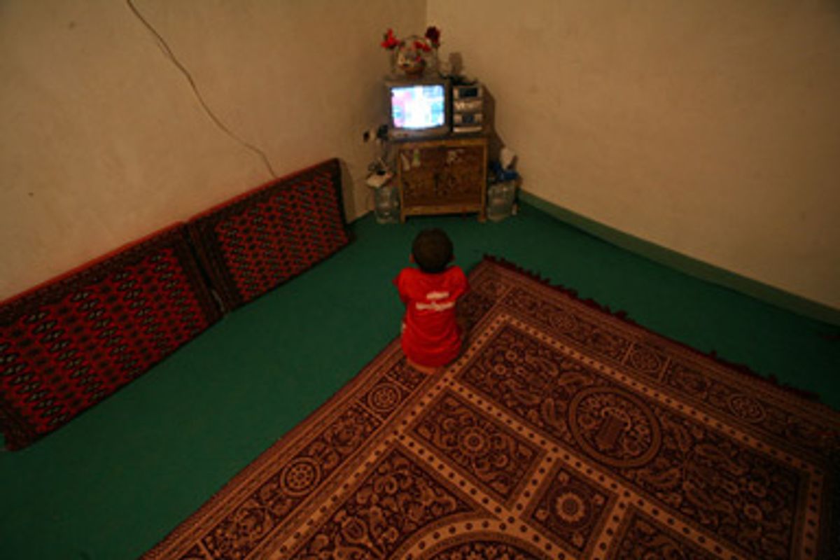 A child watches U.S. television in Bandar Abbas, Iran.
