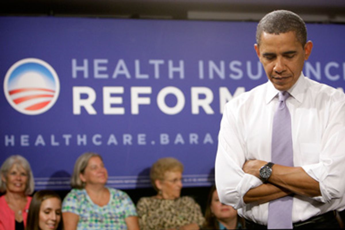 President Barack Obama listens to a question during the Organizing for America National Health Care Forum at the Democratic National Committee headquarters in Washington Thursday, Aug. 20, 2009