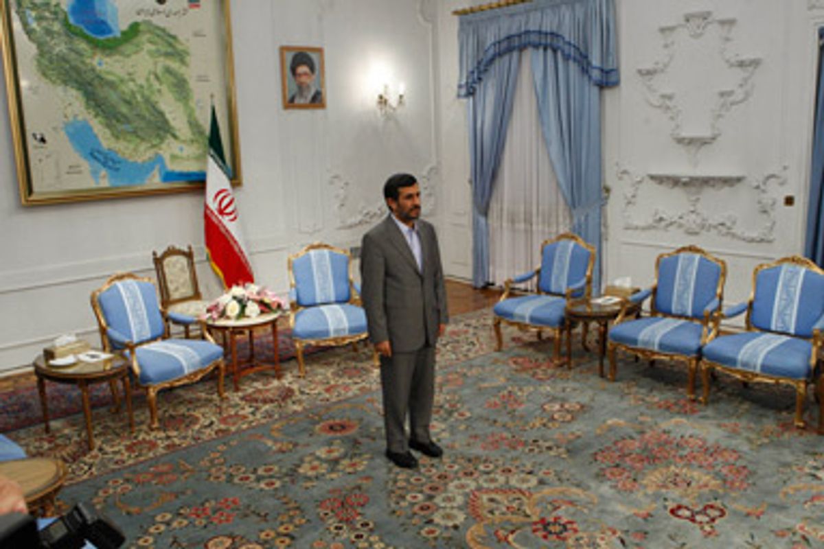 Iranian President Mahmoud Ahmadinejad waits to meet the Iraqi parliament speaker, Ayad al-Samarraie, unseen, at the presidency in Tehran, Iran, Monday, Sept. 7, 2009.