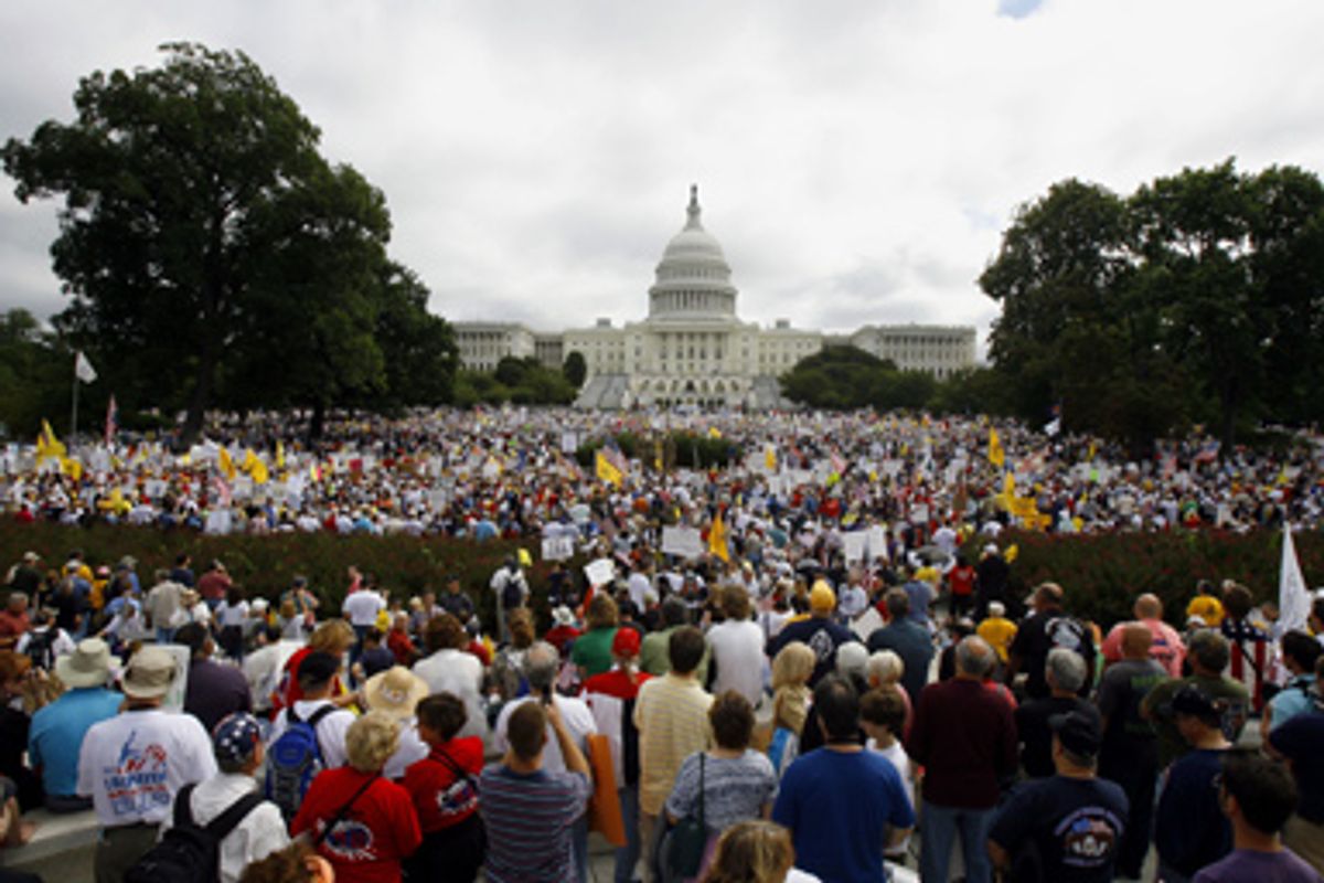 People gather on Capitol Hill in Washington, Saturday, Sept. 12, 2009, during the taxpayer rally.