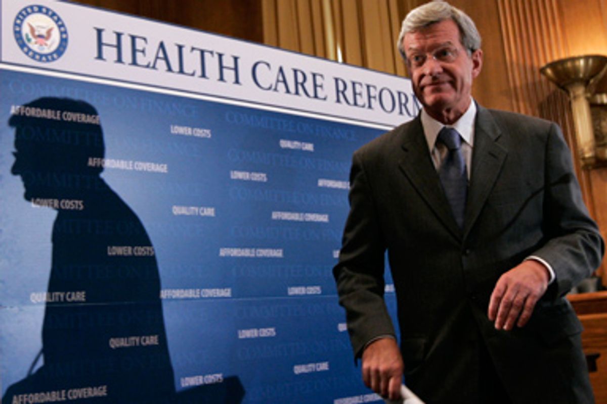 Senate Finance Committee Chairman Sen. Max Baucus, D-Mont., concludes his news conference on health care legislation, Wednesday, Sept. 16, 2009, Capitol Hill in Washington. 