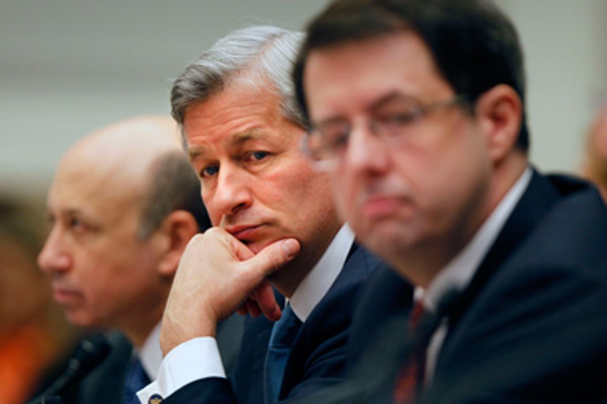 JPMorgan Chase &amp; Co. Chief Executive Officer James Dimon, center, flanked by Goldman Sachs &amp; Co. Chief Executive Officer and Chairman Lloyd C. Blankfein, left, and Bank of New York Mellon Chairman Chief Executive Officer Robert Kelly, are seen on Capitol Hill in Washington, Wednesday, Feb. 11,2009, during a House Financial Services Committee hearing.
