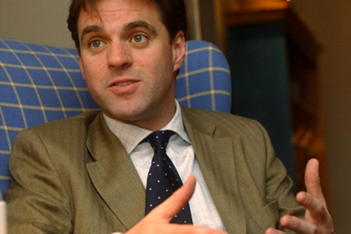 Historian and author Niall Ferguson talks about his new book, "Empire," during an intetrview in Cambridge, Mass., April 11, 2003.