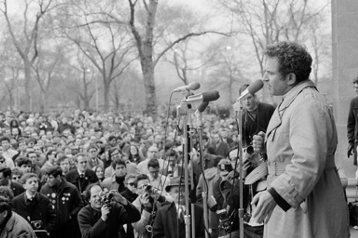 Author Norman Mailer speaks at an anti-war rally at the bandshell in New York's Central Park, March 26, 1966. 