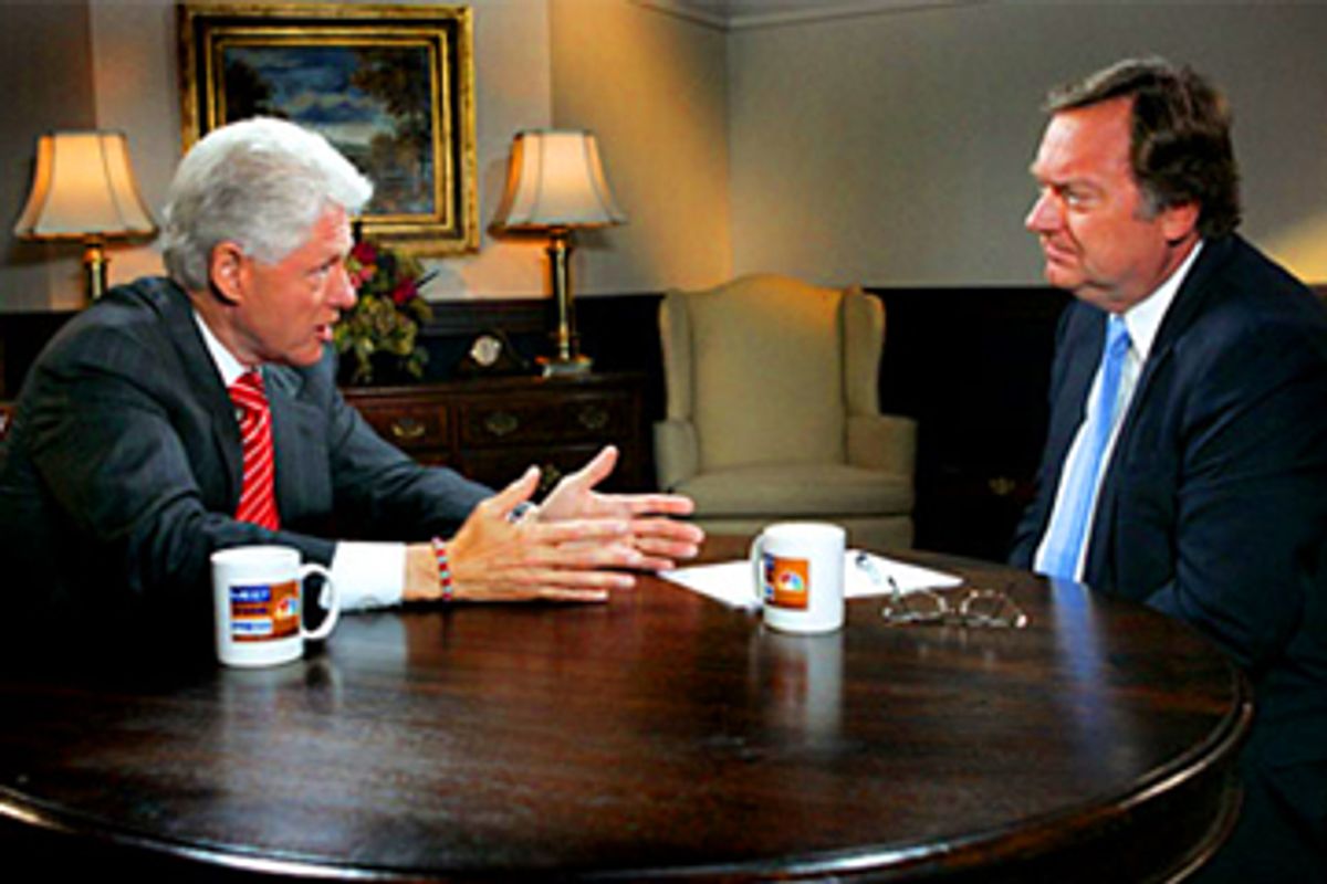 Former President Bill Clinton and Tim Russert  