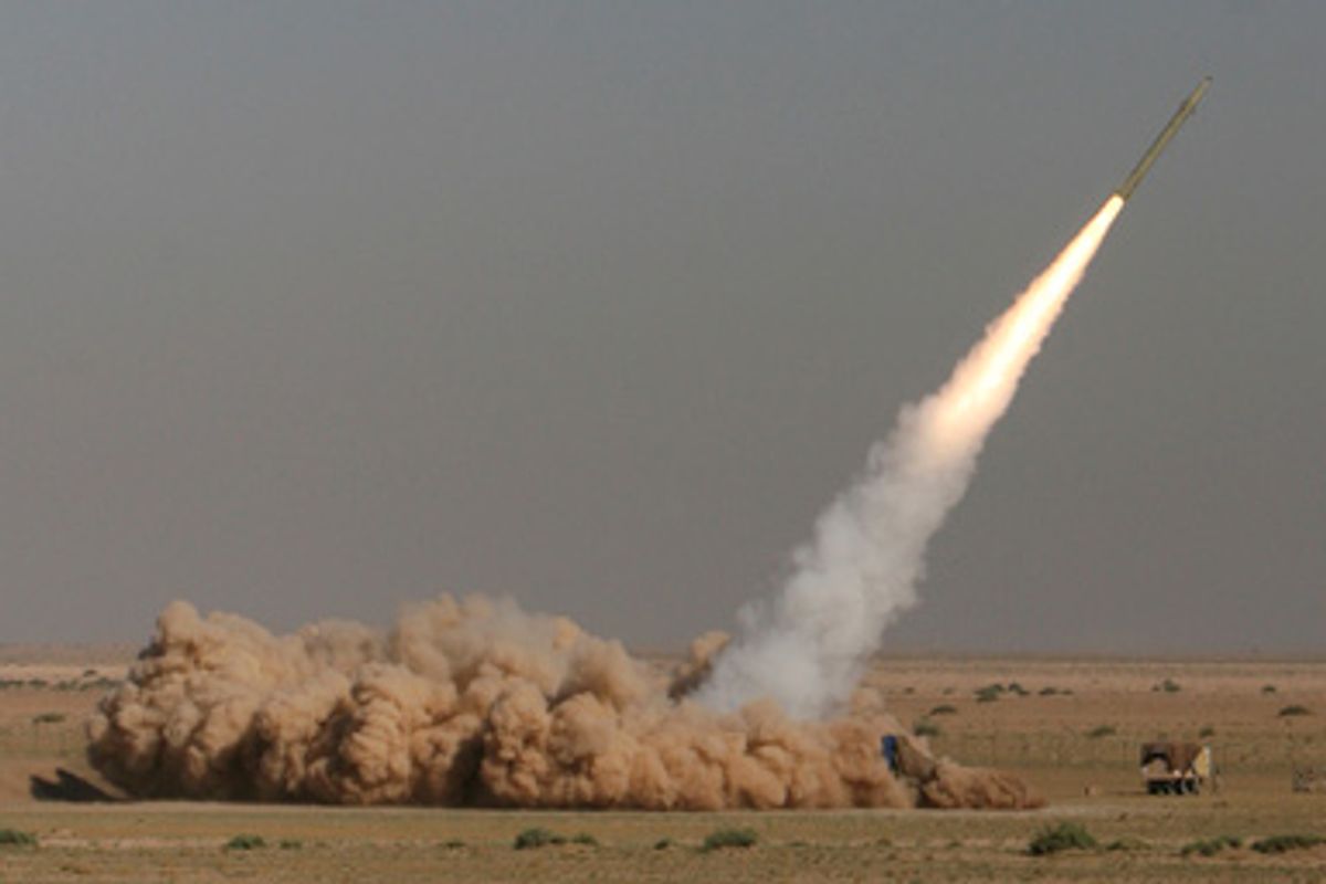 Iran said it successfully test-fired short-range missiles during military drills Sunday, Sept. 27, 2009 by the elite Revolutionary Guard, a show of force days after the U.S. warned Tehran over a newly revealed underground nuclear facility it was secretly constructing.   