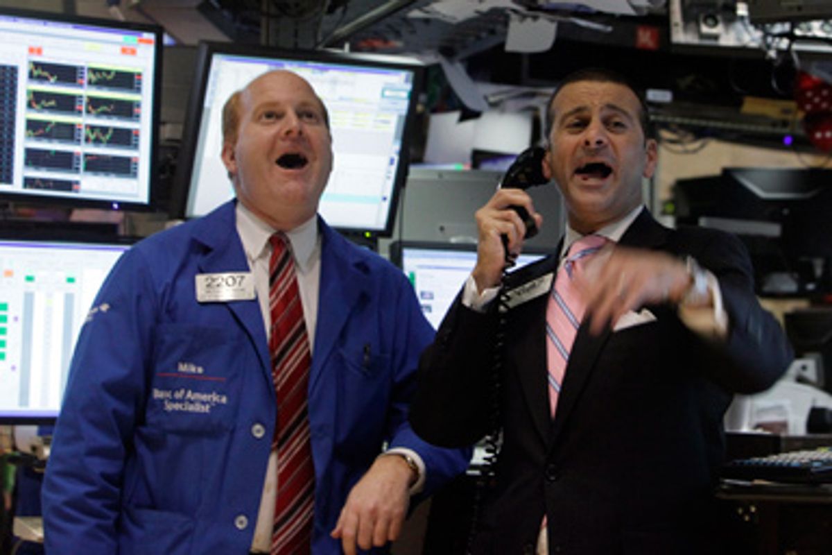 Specialists Michael Scavone, left, and Michael Sollitto react as the Dow Jones Industrial Average crosses 10,000, on the floor of the New York Stock Exchange Wednesday, Oct. 14, 2009. 