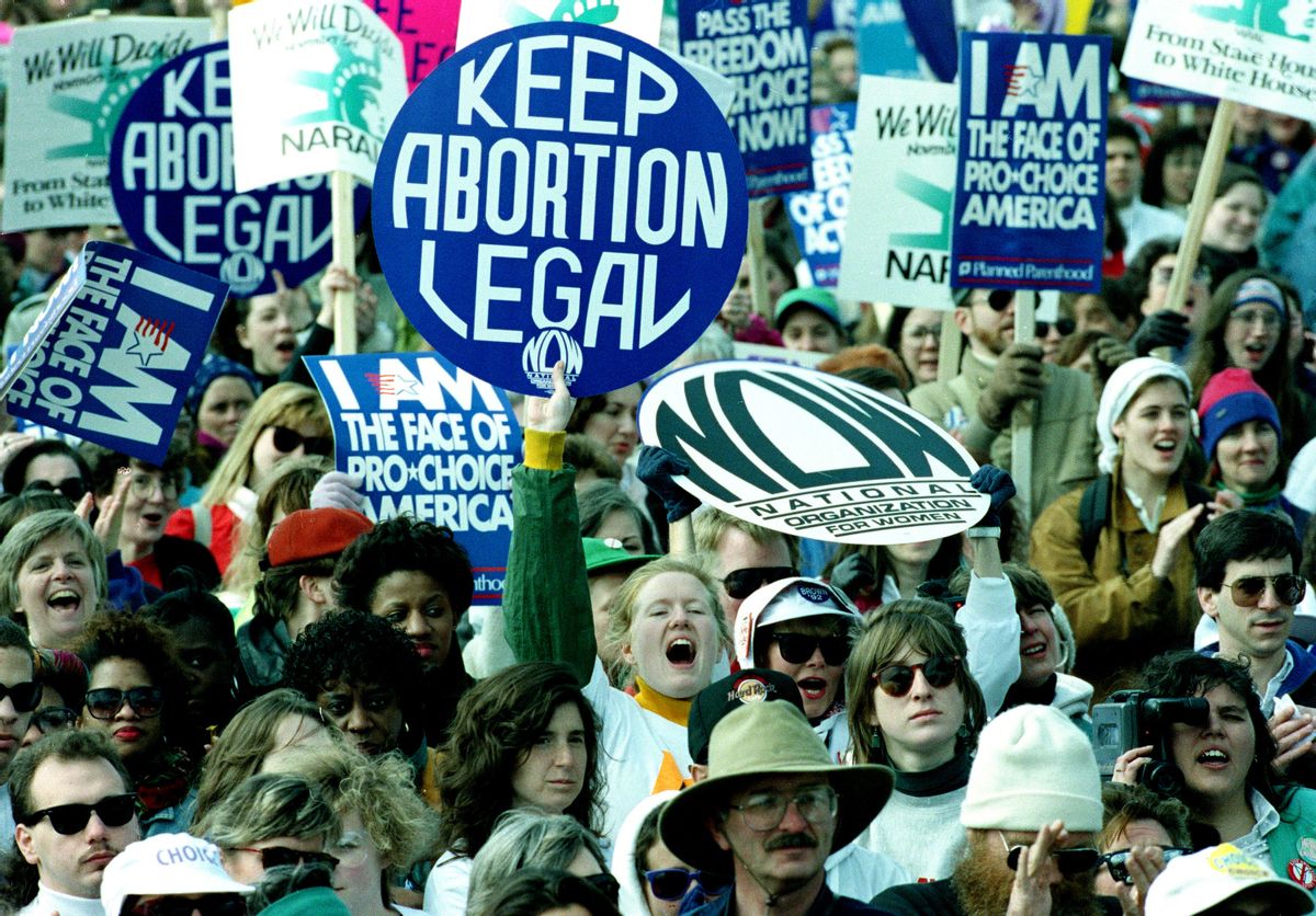Thousands of pro-choice demonstrators gather on the Ellipse near the White House in a massive March for Women's Lives rally organized by the National Organziation for Women (NOW) in Washington, D.C., April 5, 1992.  Some of the signs read, "Keep Abortion Legal," and "I Am the Face of Pro-Choice America." (AP Photo/Doug Mills) (Associated Press)