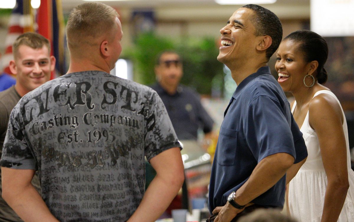 President Barack Obama, and first lady Michelle Obama, greet marines during Christmas dinner at Anderson Hall on Marine Corps Base Hawaii in Kailua, Hawaii  Friday, Dec. 25, 2009. The Obamas are in Hawaii for the holidays.(AP Photo/Alex Brandon) (Alex Brandon)