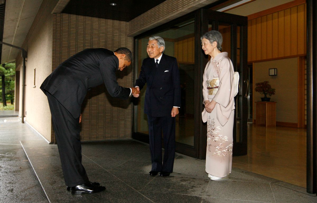 President Barack Obama bows as he is greeted by Japanese Emperor Akihito and Empress Michiko as he arrives at the Imperial Palace in Tokyo, Saturday, Nov. 14, 2009. (AP Photo/Charles Dharapak) (Charles Dharapak)