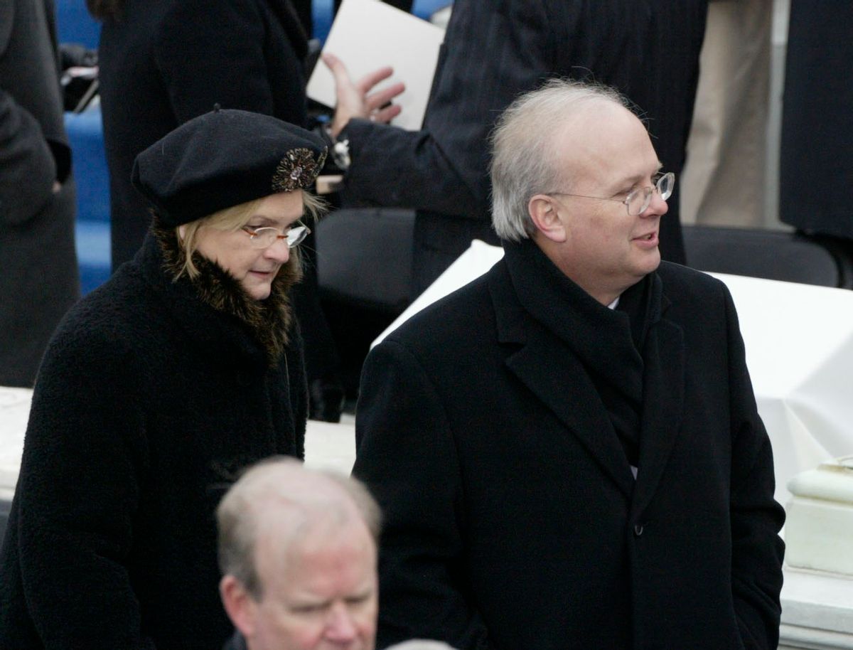 White House advisor Karl Rove and his wife Darby, left,  arrive on Capitol Hill in Washington Thursday, Jan. 20, 2005 for President Bush's inaugural. (AP Photo/Stephan Savoia) (Associated Press)