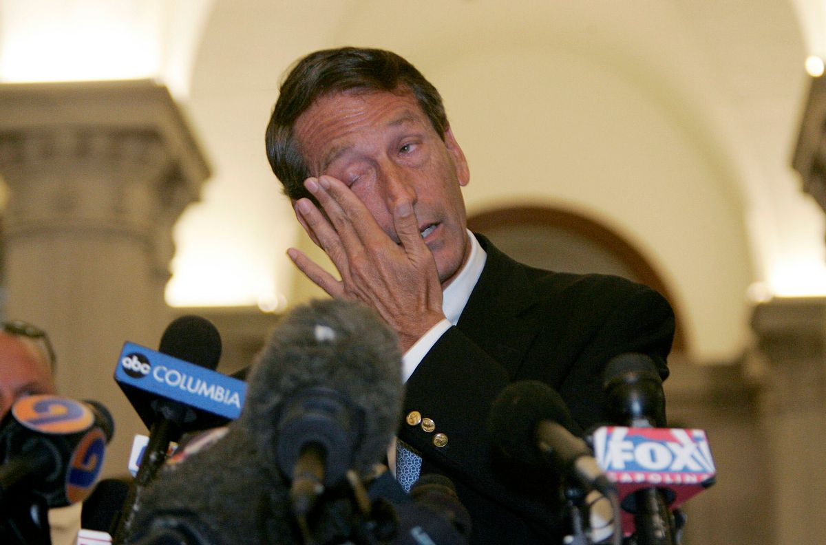 South Carolina Governor Mark Sanford wipes his eyes as he speaks to the media about his trip to Buenos Aires, Argentina and admits to an extramarital affair at the State House in Columbia, South Carolina, June 24, 2009. Governor Sanford said on Wednesday he was resigning as Chairman of the Republican Governors' Association after admitting to having an affair and being unfaithful to his wife. "I've been unfaithful to my wife," he told a news conference in the South Carolina capital of Columbia after returning from a secret private trip to Argentina.  REUTERS/Erik Campos/The State   (UNITED STATES POLITICS IMAGE OF THE DAY TOP PICTURE)     (Reuters)