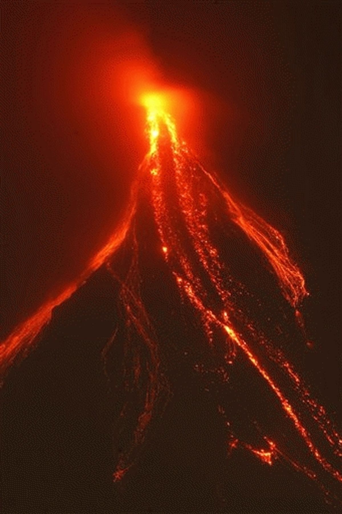 Lava continues to cascade down the slopes of Mayon volcano as viewed from Legazpi city in Albay province, 500 kilometers southeast of Manila, Philippines, Sunday .