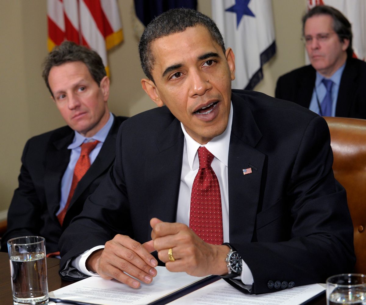 Treasury Secretary Timothy Geithner looks on at left, President Barack Obama makes a statement in the Roosevelt Room of the White House in Washington, Tuesday, Dec.  22, 2009, after meeting with chief executive Officers of small and community banks. (AP Photo/Susan Walsh)  (Associated Press)