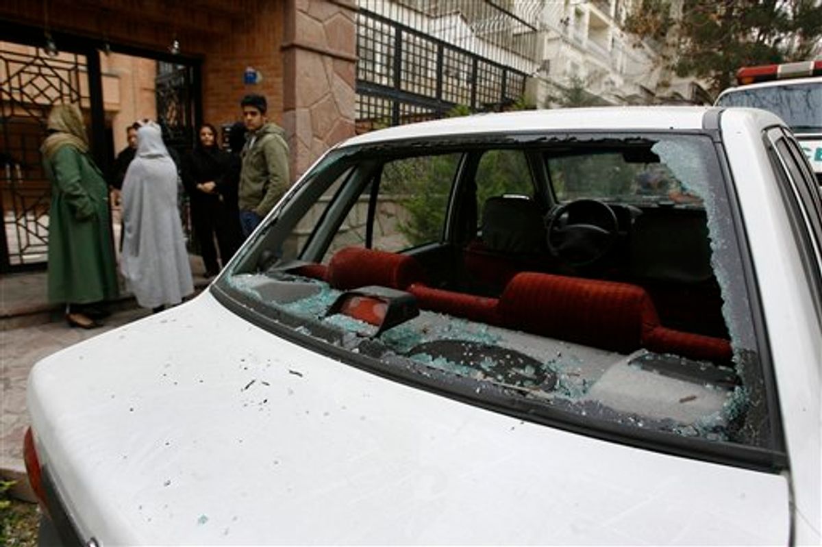 The window of a car is shattered after a bomb blast which killed  Iranian nuclear physics professor Massoud Ali Mohammadi, in front of his house, in northern Tehran's Qeytariyeh neighborhood, Tuesday, Jan. 12, 2010. A nuclear physics professor at Tehran University was killed Tuesday by a bomb-rigged motorcycle parked outside his home in Iran's capital, state media reported. (AP Photo,ISNA,Mona Hoobehfekr) (AP)