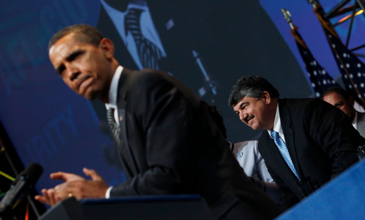 President Barack Obama acknowledges AFL-CIO Secretary-Treasurer Richard Trumka, right,as he addresses the AFL-CIO, Tuesday, Sept. 15, 2009, at the David L. Lawrence Convention Center in Pittsburgh. (AP Photo/Charles Dharapak)   (Associated Press)