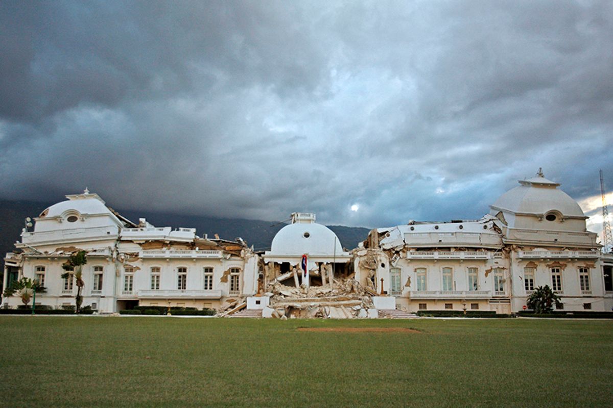 Haiti's National Palace is seen after in Port-au-Prince,  Wednesday, Jan. 13, 2010, the day after a powerful earthquake hit the country. (AP Photo/Ricardo Arduengo)   (Ricardo Arduengo)