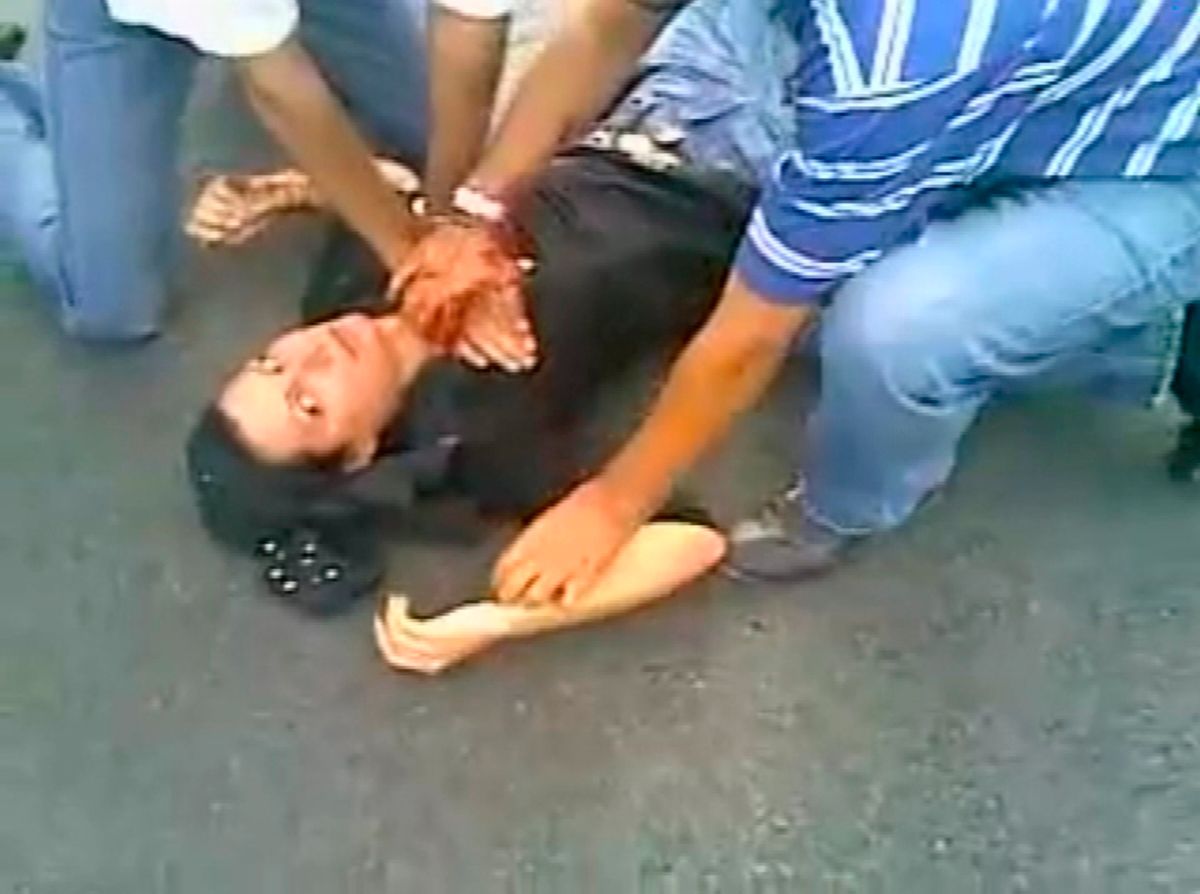 EDITORS' NOTE: Reuters and other foreign media are subject to Iranian restrictions on their ability to report, film or take pictures in Tehran. 

A frame grab from YouTube shows a woman identified as Neda Agha-Soltan lying on the ground after getting shot in the chest in Tehran June 20, 2009. Iranians on social networking sites called for mourning for "Neda", a young woman shot dead on Saturday. Footage of her death has been watched by thousands on the Internet and her image has become an icon of the protests.  

REUTERS/YouTube   (IRAN POLITICS ELECTIONS CONFLICT) QUALITY FROM SOURCE. FOR EDITORIAL USE ONLY. NOT FOR SALE FOR MARKETING OR ADVERTISING CAMPAIGNS (Reuters)