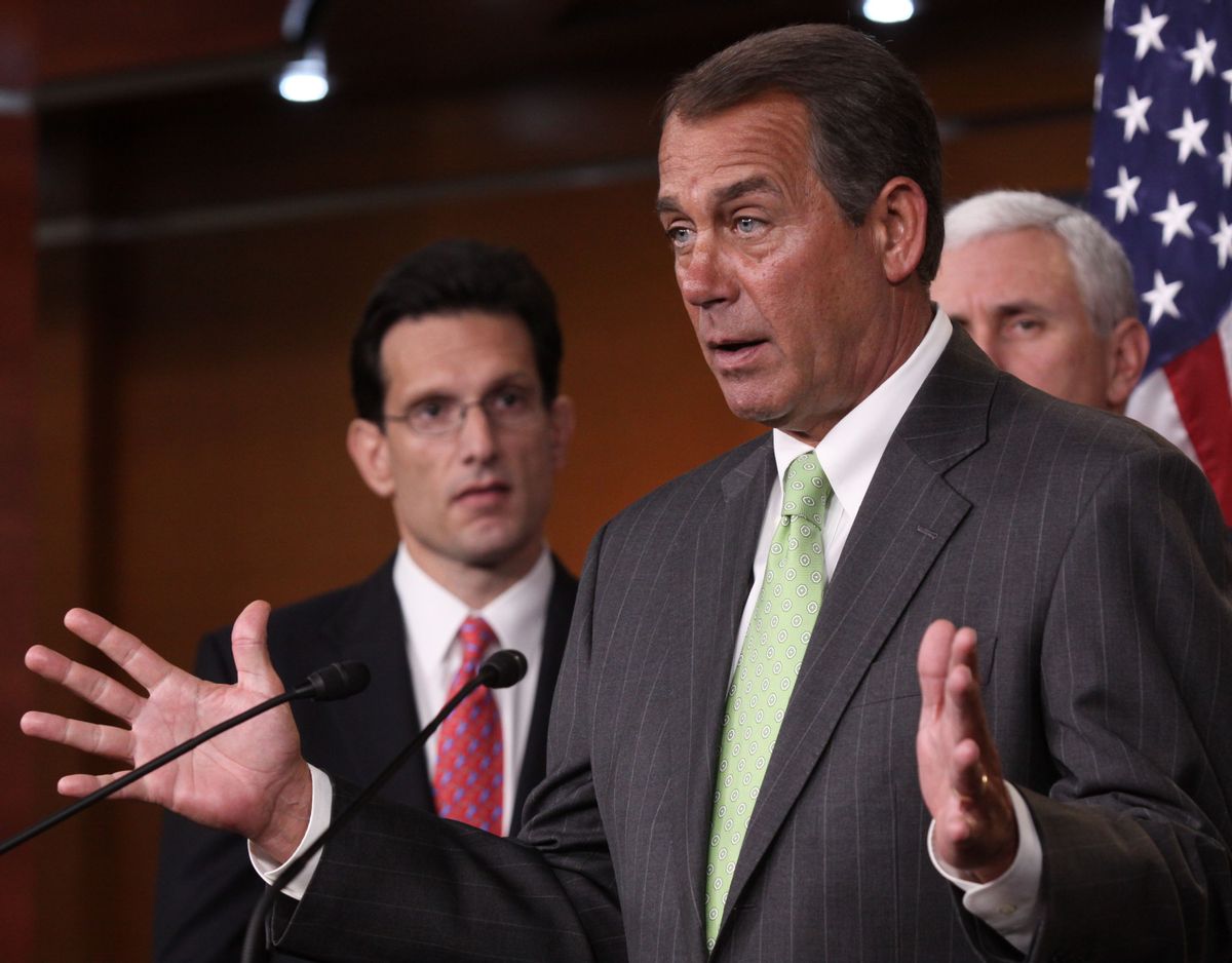 House Minority Leader John Boehner of Ohio, center, accompanied by House Minority Whip Eric Cantor of Va., left, and Rep. Mike Pence, R-Ind., gestures during a news conference on Capitol Hill in Washington, Wednesday, Jan. 20, 2010, to talk about the  Massachusetts Senate election. (AP Photo/Lauren Victoria Burke)       (Associated Press)