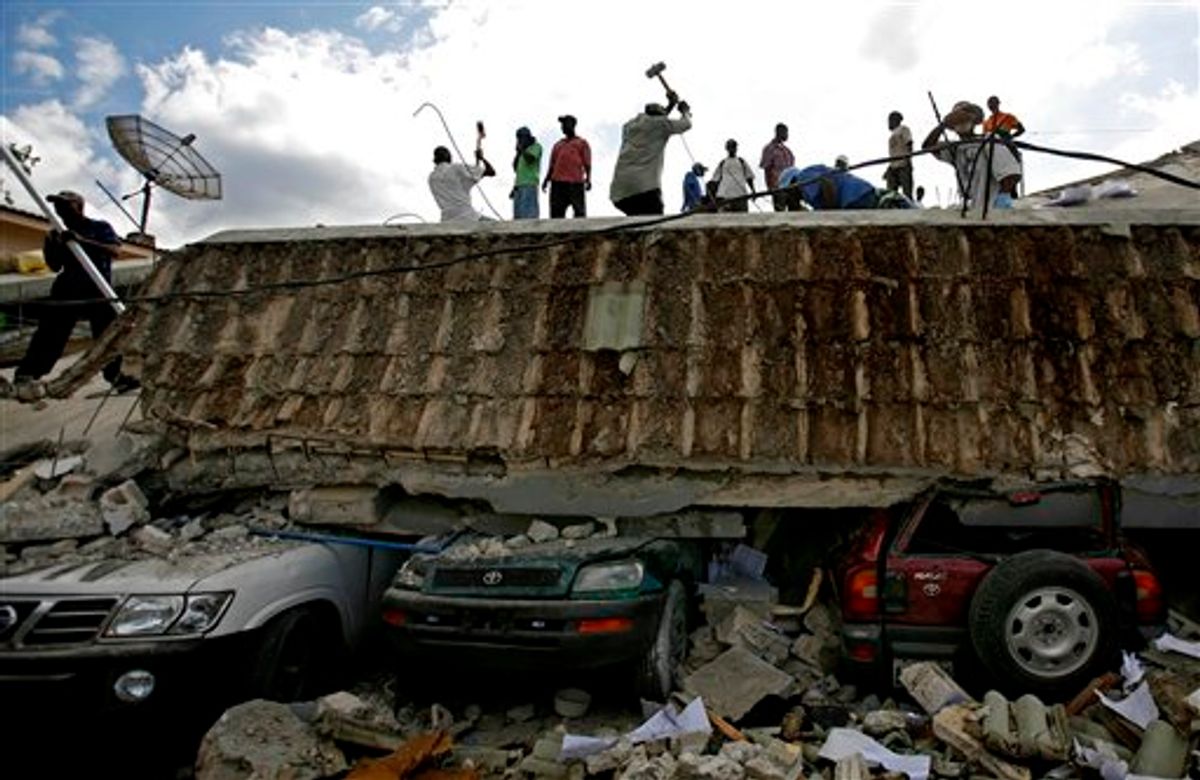 People search for survivors under the rubble of a collapse building the day after an earthquake hit Port-au-Prince, Haiti, Wednesday, Jan. 13, 2010.  The 7.0-magnitude earthquake that hit Haiti on Tuesday flattened the president's palace, the cathedral, hospitals, schools, the main prison and whole neighborhoods. (AP Photo/Ricardo Arduengo)  (AP)