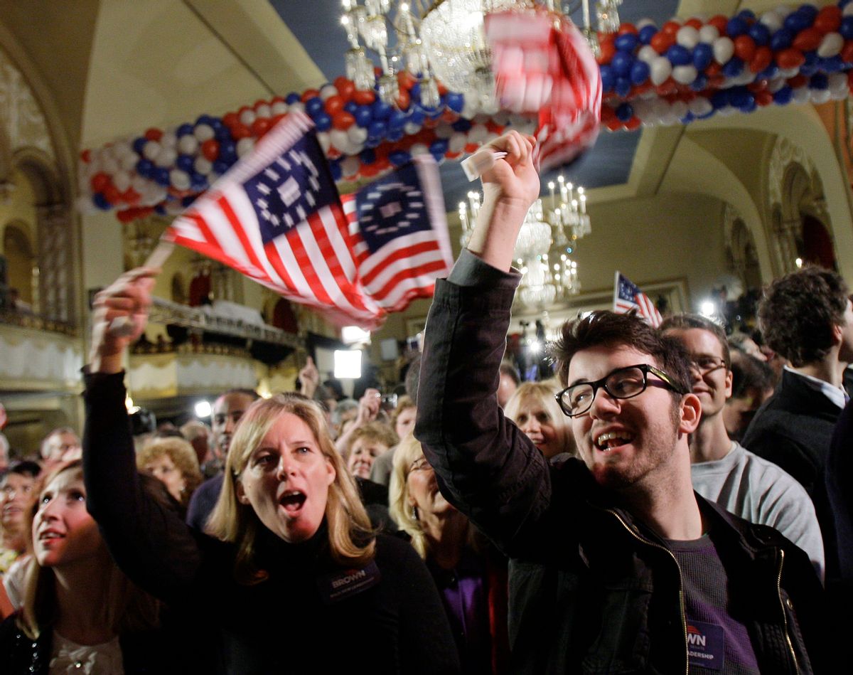 Supporters of Massachusetts State Sen. Scott Brown, R-Wrentham, Barbara Ann O'Neill, left, of Wrentham, Mass., and Jacob Porter, right, of Bucks County, Penn., wave flags before results are announced at Brown's election-night headquarters in Boston, Tuesday, Jan. 19, 2010. Brown is on the ballot of a special election held to fill the U.S. Senate seat left vacant by the death of Sen. Edward Kennedy. He is running against Massachusetts Attorney General Martha Coakley, a Democrat, and Joseph L. Kennedy, a Libertarian running as an independent and not related to the late Sen. Kennedy.  (AP Photo/Elise Amendola) (Elise Amendola)