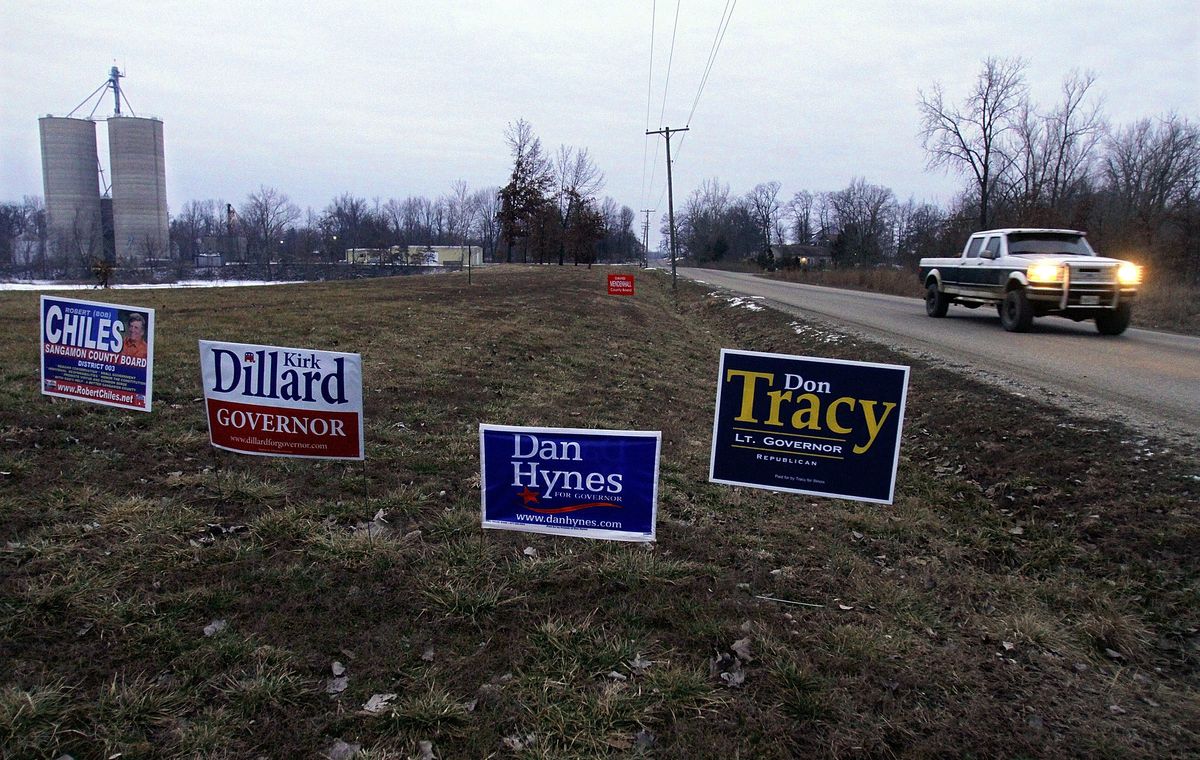 Grain elevators are seen in the background next to an Illinois primary election polling place in Buckhart, Ill., Tuesday, Feb. 2, 2010. (AP Photo/Seth Perlman) (Associated Press)