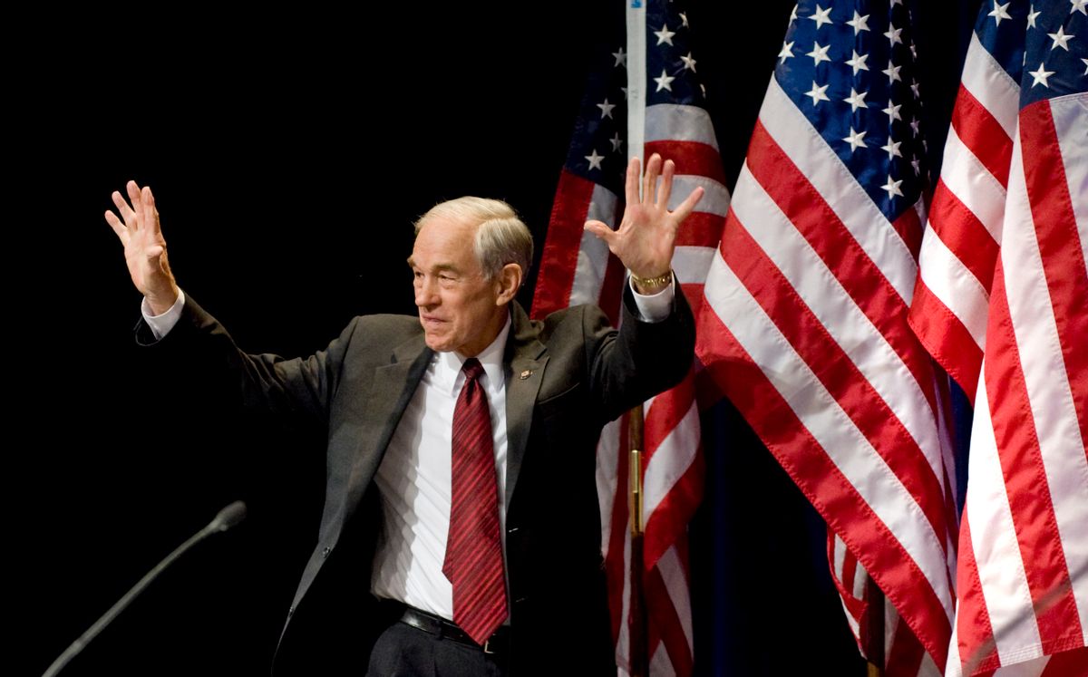 Former presdential candidate Ron Paul walks onstage to address the Conservative Political Action Conference (CPAC) in Washington, Friday, Feb. 19, 2010. (AP Photo/Cliff Owen) (Associated Press)