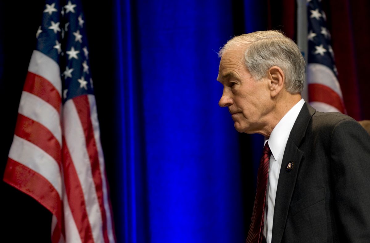 Former presidential candidate Ron Paul walks off stage after addressing the Conservative Political Action Conference (CPAC) in Washington, Friday, Feb. 19, 2010. (AP Photo/Cliff Owen) (Associated Press)