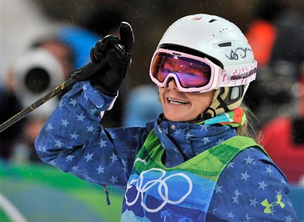 Michelle Roark of the USA reacts after her moguls qualifications run at the Vancouver 2010 Olympics in Vancouver, British Columbia, Saturday, Feb. 13, 2010. (AP Photo/Bela Szandelszky) (AP)