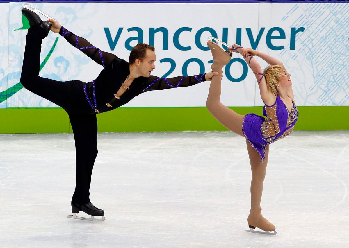Caydee Denny (front) and Jeremy Barrett of the U.S. perform during the pairs free skating figure skating event at the Vancouver 2010 Winter Olympics February 15, 2010.     REUTERS/David Gray (CANADA) (Reuters)
