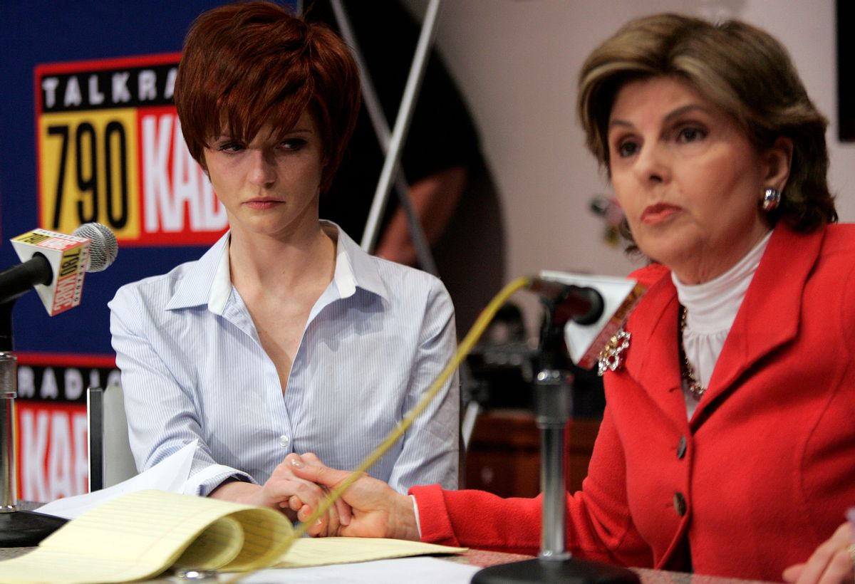 Veronica Siwik-Daniels, left, a former porn star who claims she had a three-year romantic relationship with golfer Tiger Woods, and her attorney Gloria Allred hold a news conference in reaction to Woods' apology in Los Angeles, Friday, Feb. 19, 2010. (AP Photo/Jason Redmond) (Associated Press)