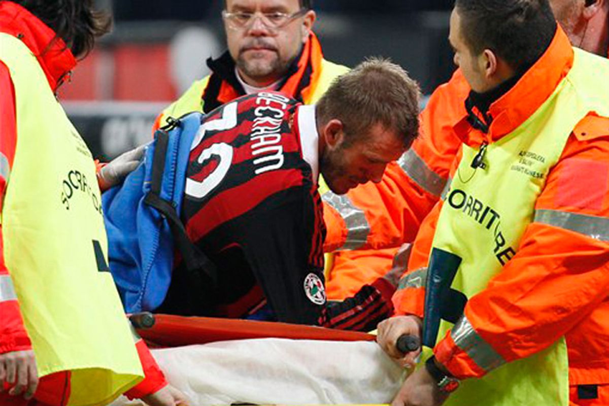 David Beckham leaves the pitch after being injured during a match on Sunday. 