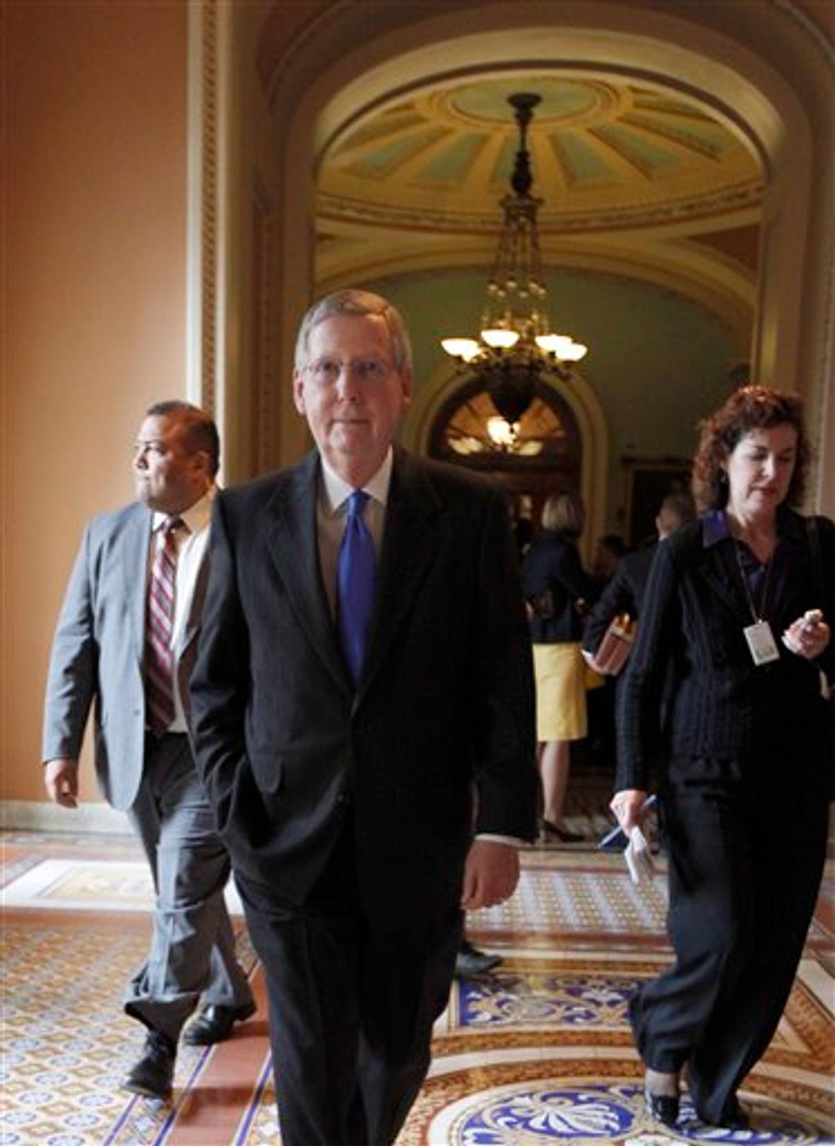 Senate Minority Leader Mitch McConnell of Ky. walks from the Senate chamber on Capitol Hill in Washington, Thursday, March 25, 2010.  (AP Photo/Manuel Balce Ceneta) (AP)